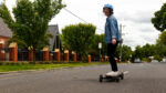 riding an electric skateboard
