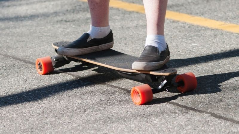 riding an electric skateboard