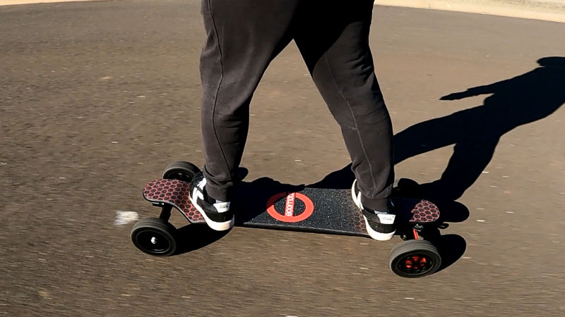 riding the Ecomobl ET electric skateboard